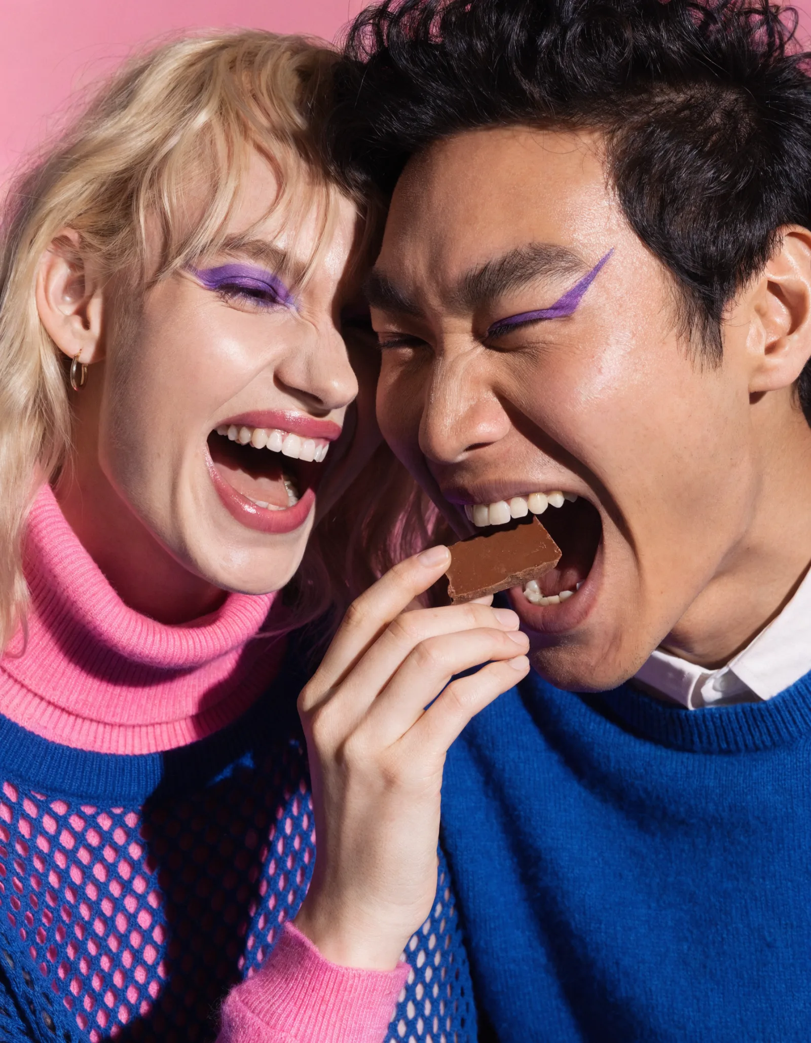 Couple sharing chocolate